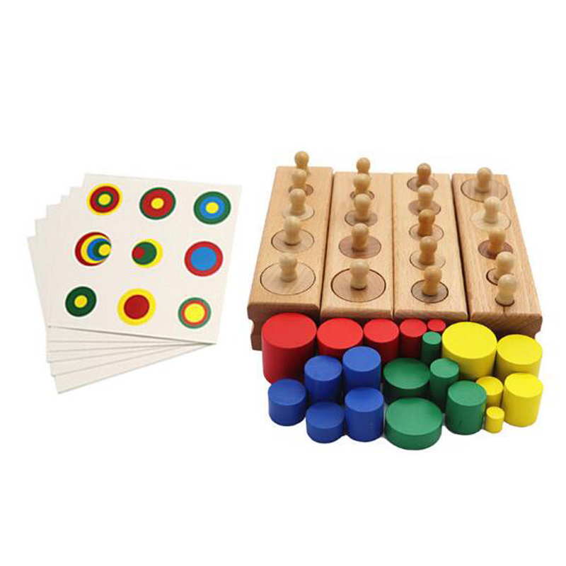 Jeu en bois d’éveil aux tailles cylindriques et aux couleurs, mettre les cylindres dans les trous correspondant, de couleur rouge, jaune, vert et bleu